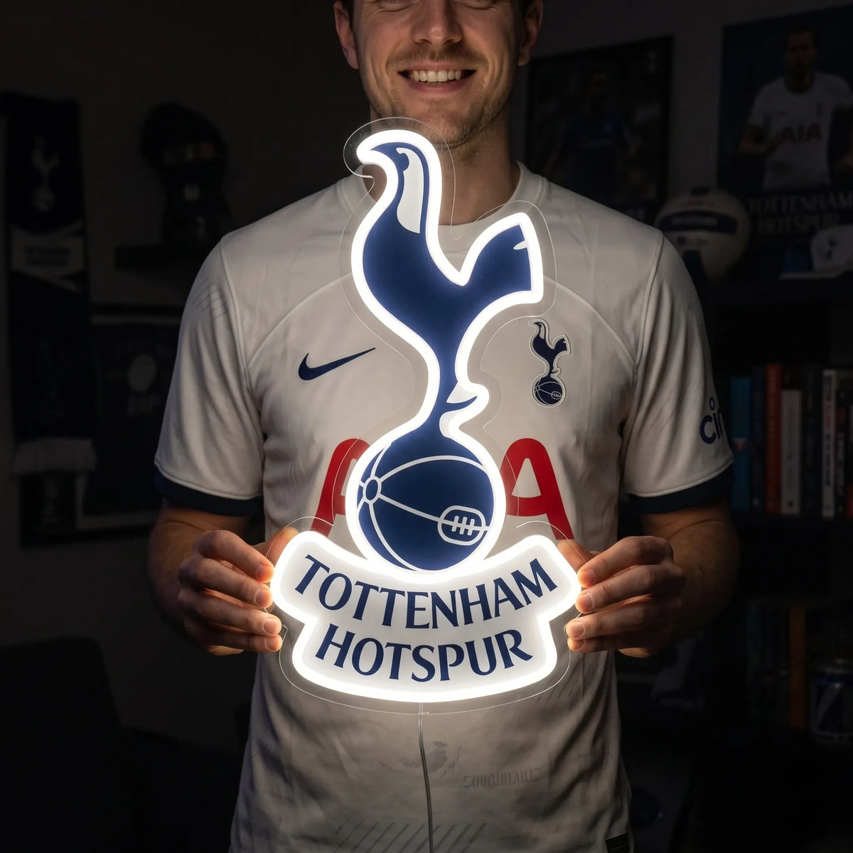 Fan holding a glowing Tottenham Hotspur FC LED Neon Sign showcasing realistic brightness and size