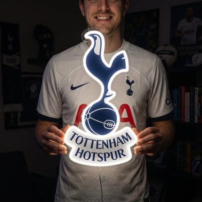 Fan holding a glowing Tottenham Hotspur FC LED Neon Sign showcasing realistic brightness and size